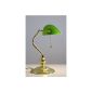 brass polished bankers lamp with a green glass