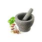 Mortar and pestle made of granite stone (household goods)
