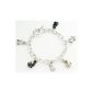 Charm Bracelet cat pattern.  6 charms on a silver plated Bracelet (Jewelry)